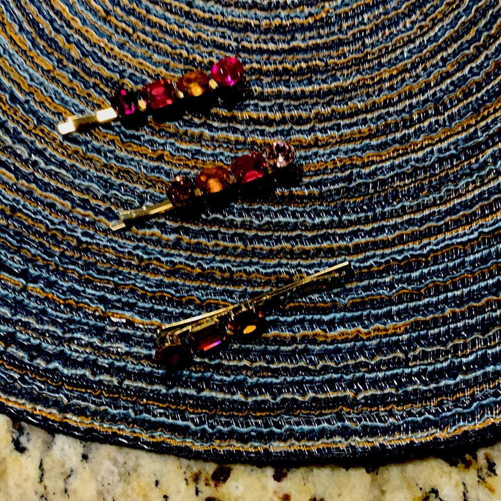 I am selling some gold pink and yellow tinted hair clips from Ann Taylor Loft